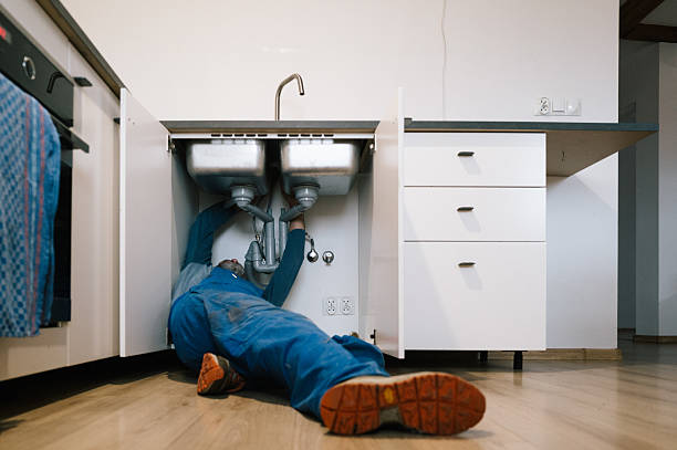 Professional Emergency Plumber technician working in Martins Ferry, OH